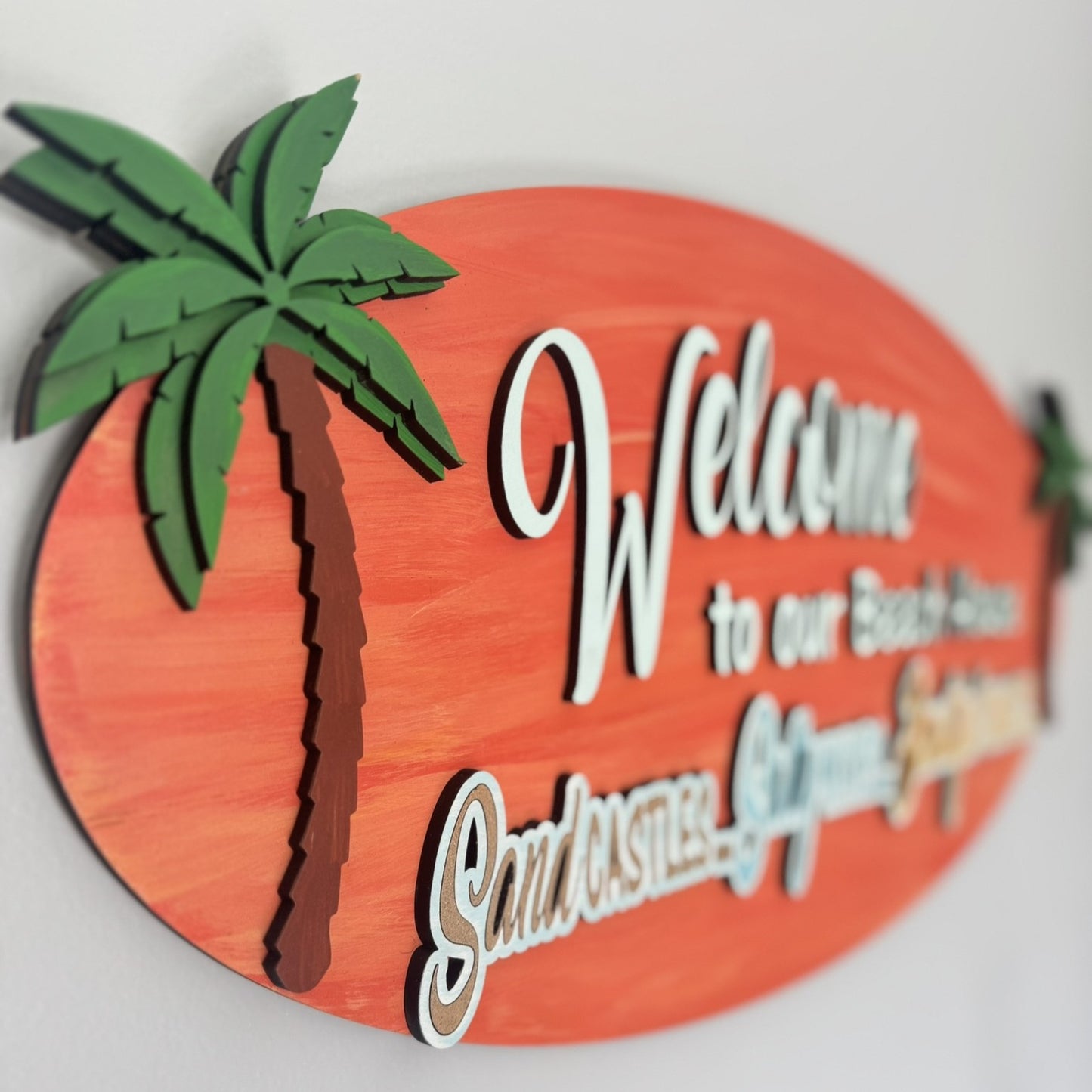 "Welcome to Our Beach House" – Hand Painted Surfboard-Style Wall Sign (25" x 12")